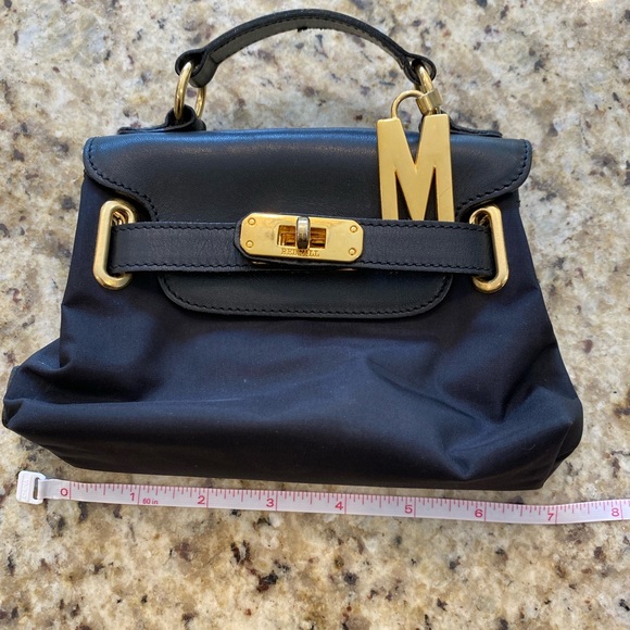 Moschino Mini black nylon and leather purse with gold trim. - Picture 2 of 7